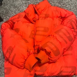Red puffer jacket